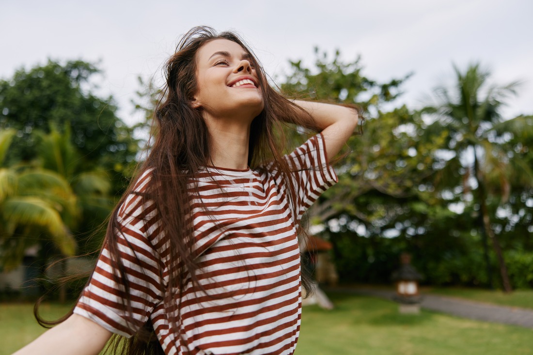 woman smiling outside