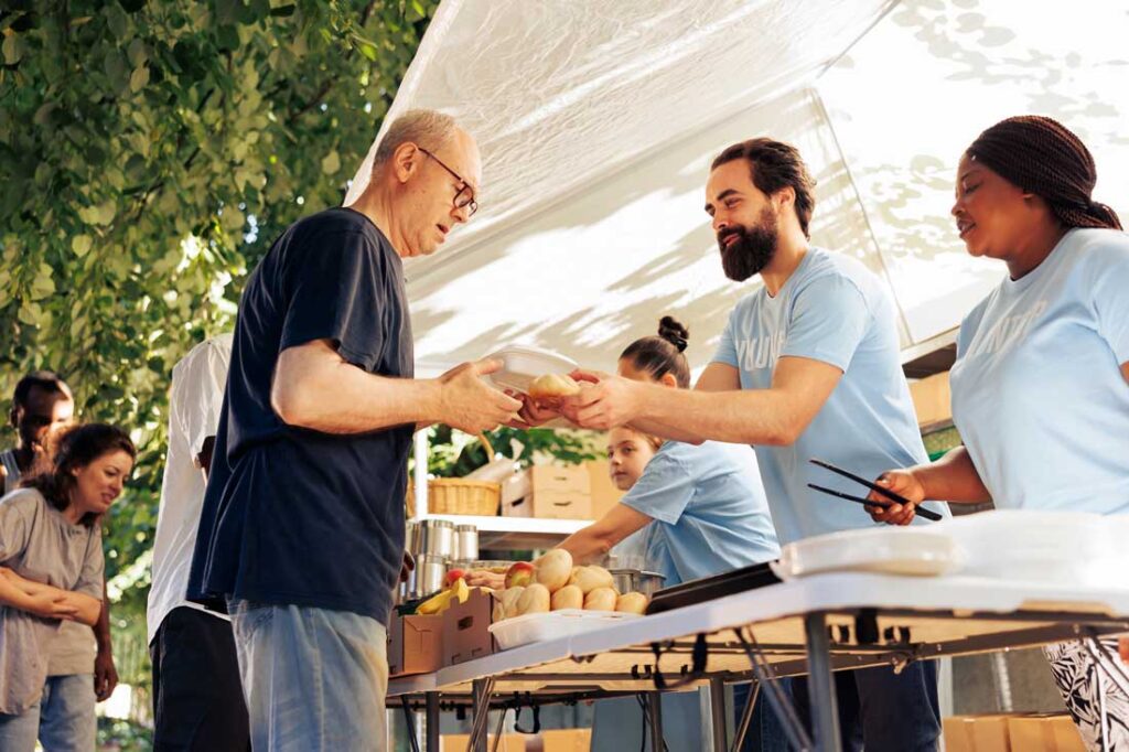 A group of volunteers exemplifying volunteer quotes