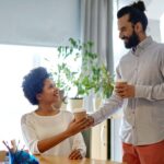 generous man brings colleague coffee as act of kindness