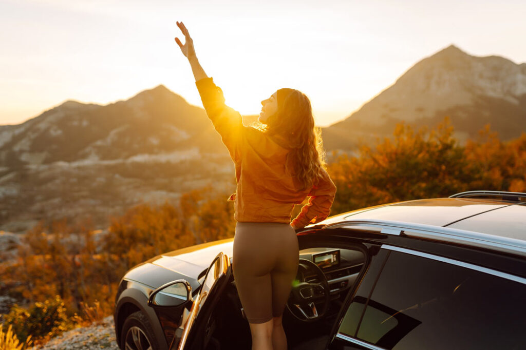 Women reaching for the sky with inspirational quotes