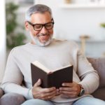 man reading book