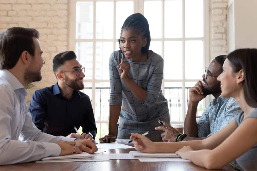 Young women executive giving leadership quotes