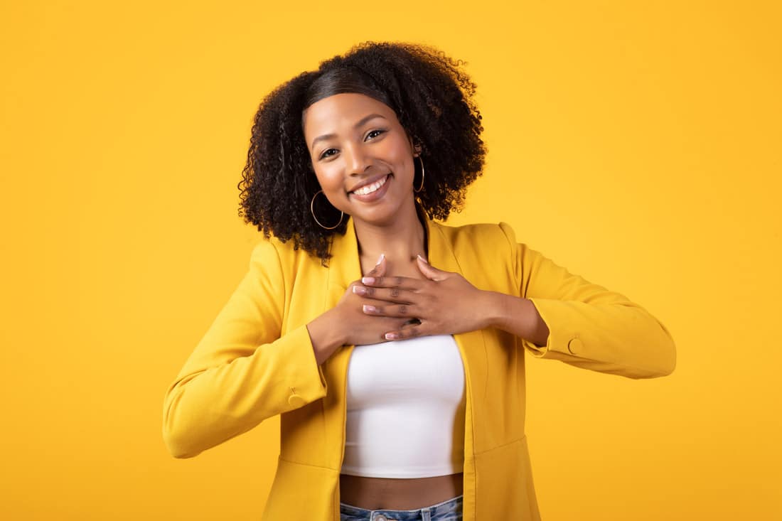 Young women showing thanks for thankful quotes