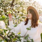 woman smelling spring flowers