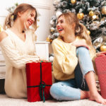 two young women with christmas presents