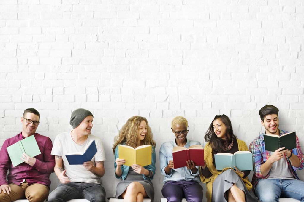 a diverse group of young people reading and telling stories