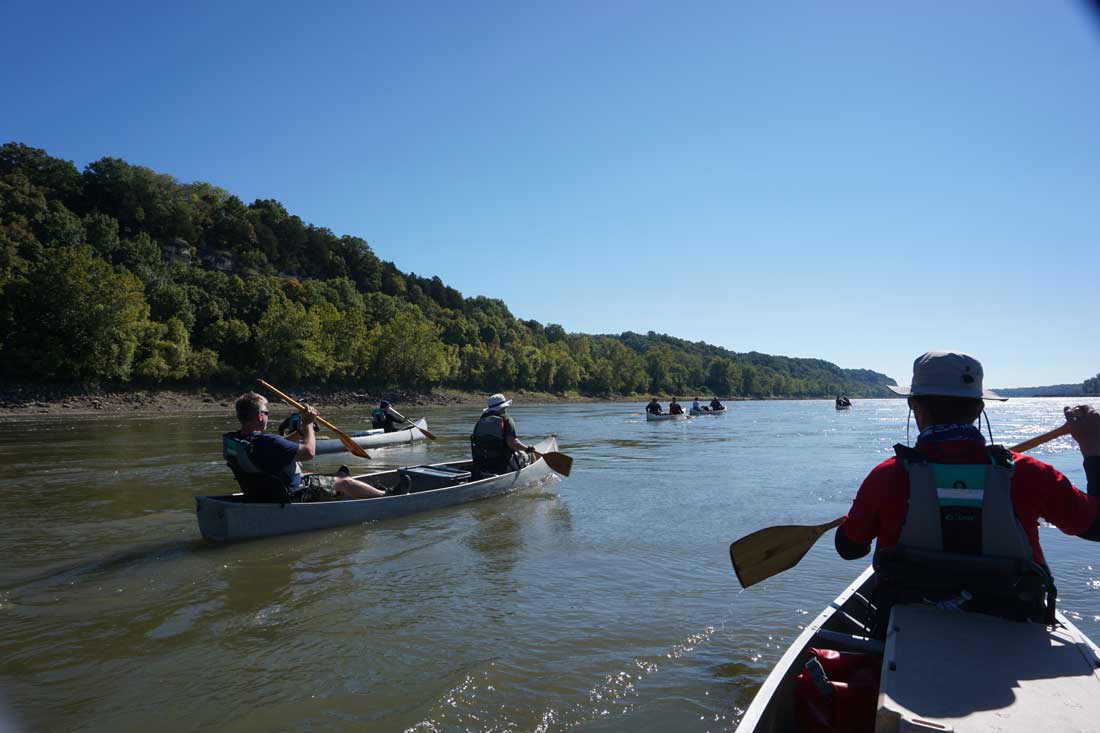 group of friends canoeing