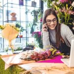 flower shop entrepreneur on the phone