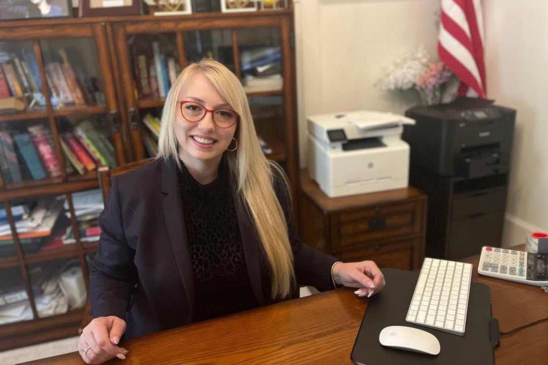 Lia Neumann founder of IBL Elements Inc at her desk