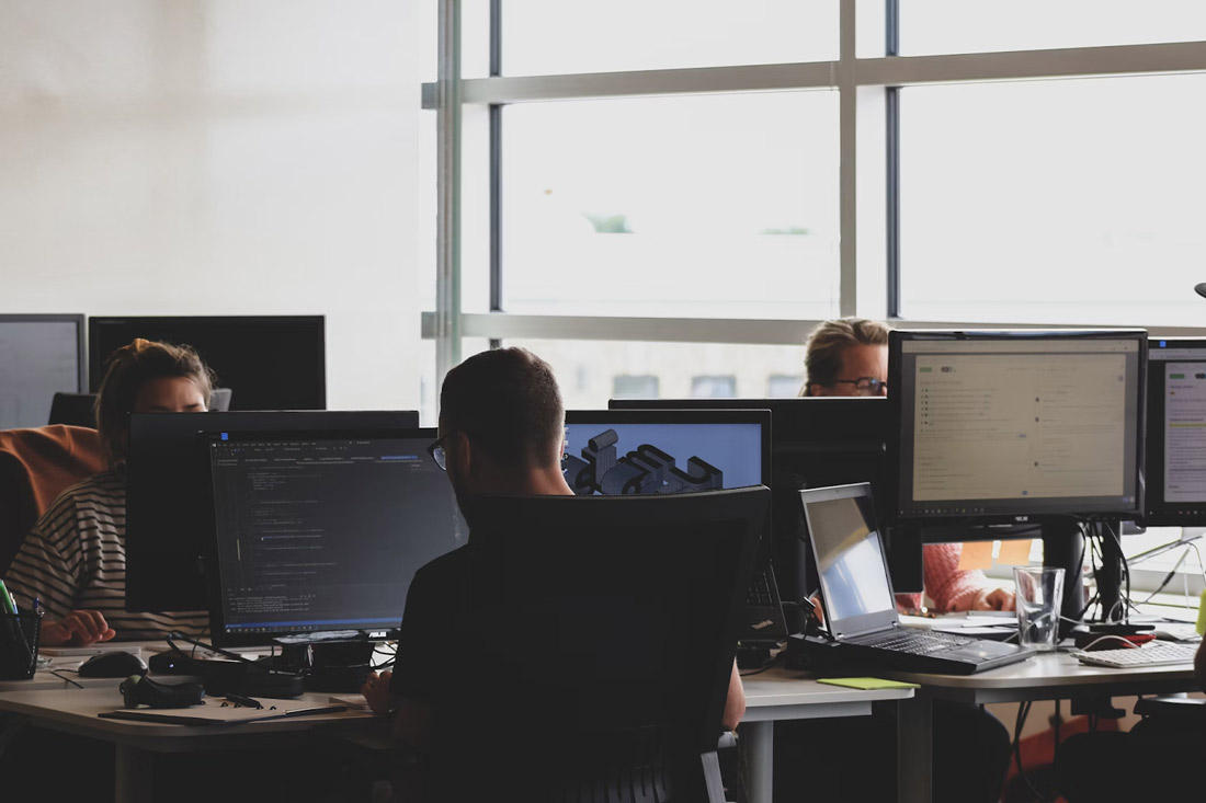 Cloud Security team working on their computers