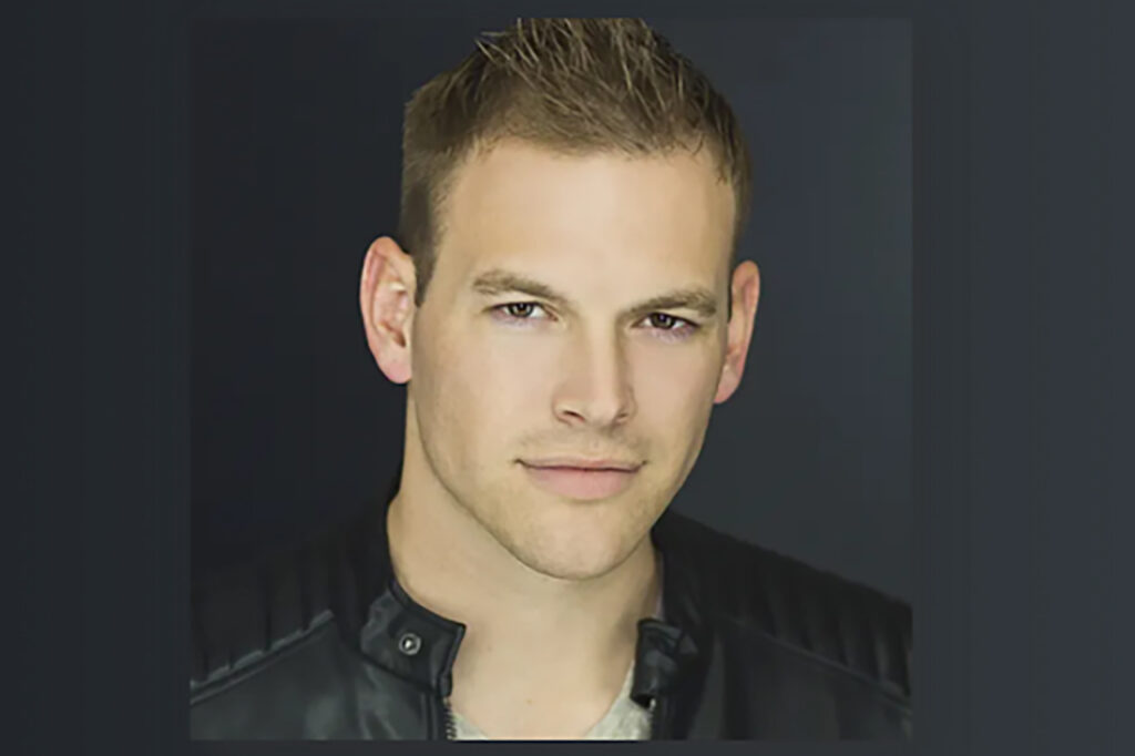 Landon Hall, white man with short haircut in black leather jacket