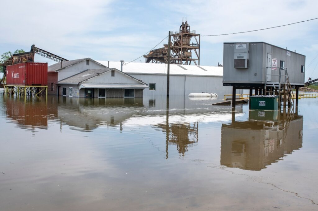 A business is flooded under standing water.