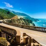 car crossing bridge in Big Sur, California