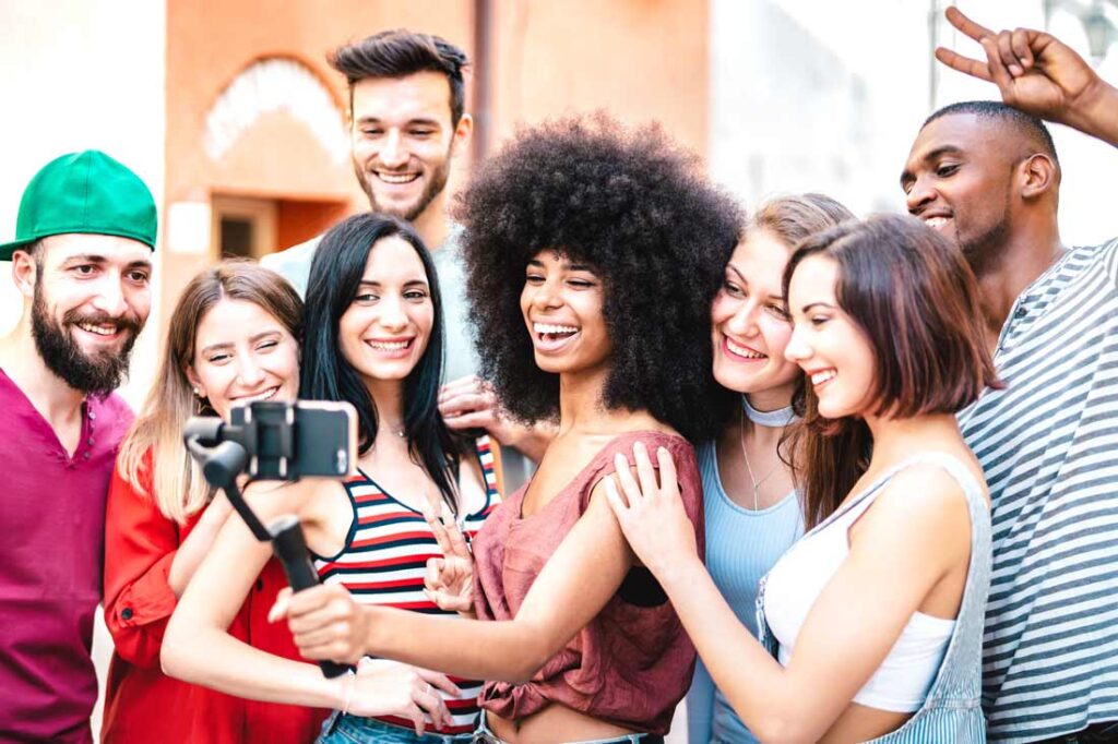 group of happy young social media influencers exemplifying team epiphany