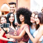 group of happy young social media influencers exemplifying team epiphany