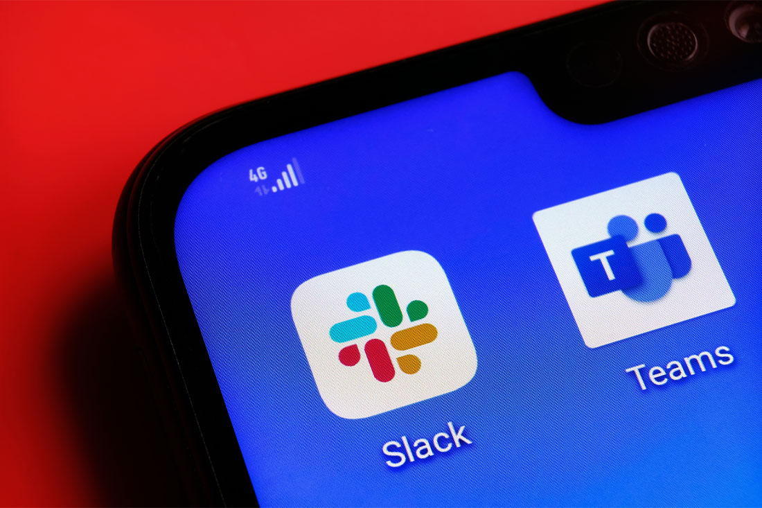 a phone screen with tech tools for small businesses, showing Slack and Teams mobile apps