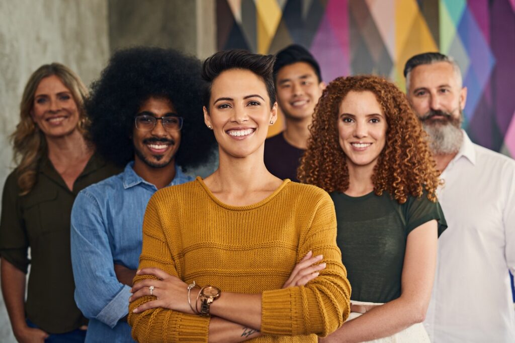 a group of smiling employees