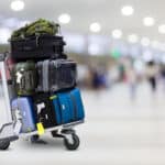 luggage on a carrier in the airport