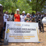 Pencils of Promise CEO Kailee Scales, rapper Ja Rule, and local community members in Ghana at an opening ceremony for a newly built school in the country