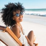 Happy young women on the beach exemplifying mood elevator