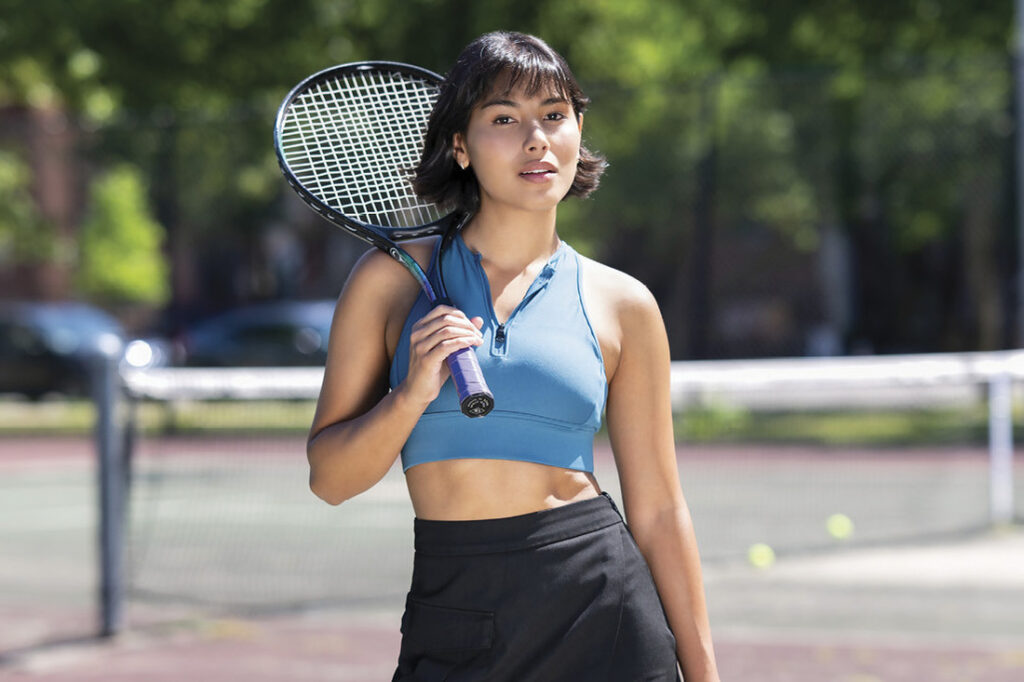 Britney Wittes holding a tennis racket