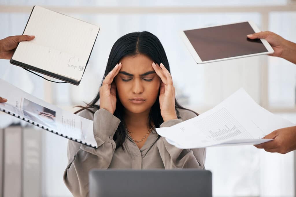 Young women feeling overwhelmed by work and life