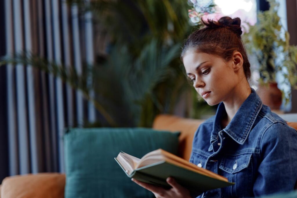 Young women reads the best financial literacy books