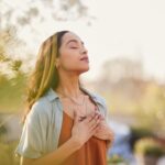 woman meditating outside