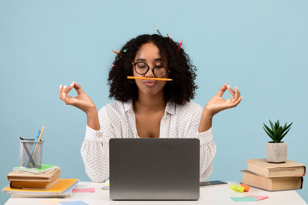 millennial woman learning how to balance work life and university study