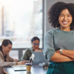 Happy, arms crossed and portrait of business woman in meeting