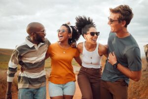 a diverse group of friends laughing together