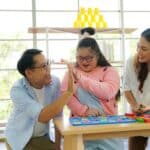 Special needs family playing together