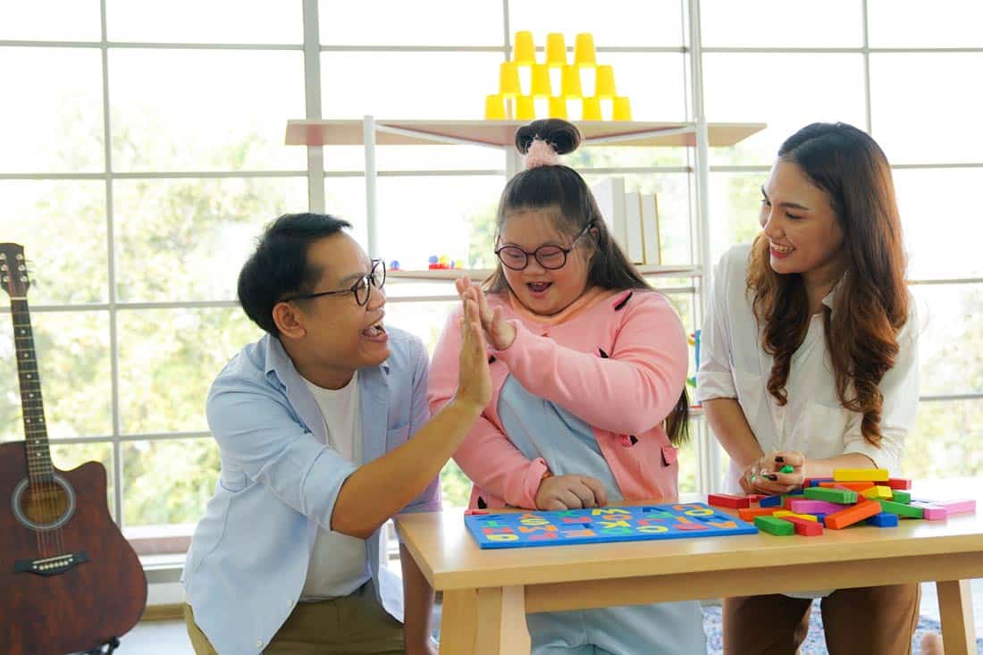 Special needs family playing together