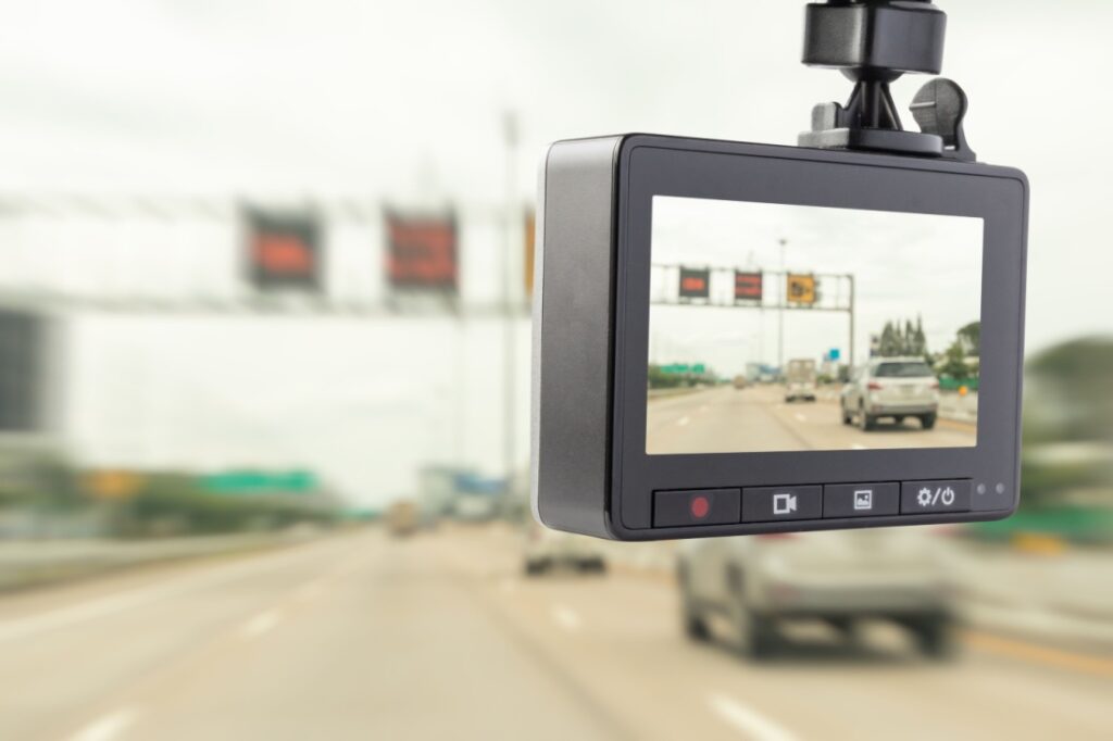 A dash cam captures video of the road ahead.