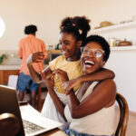 African-american working mother with her daughter