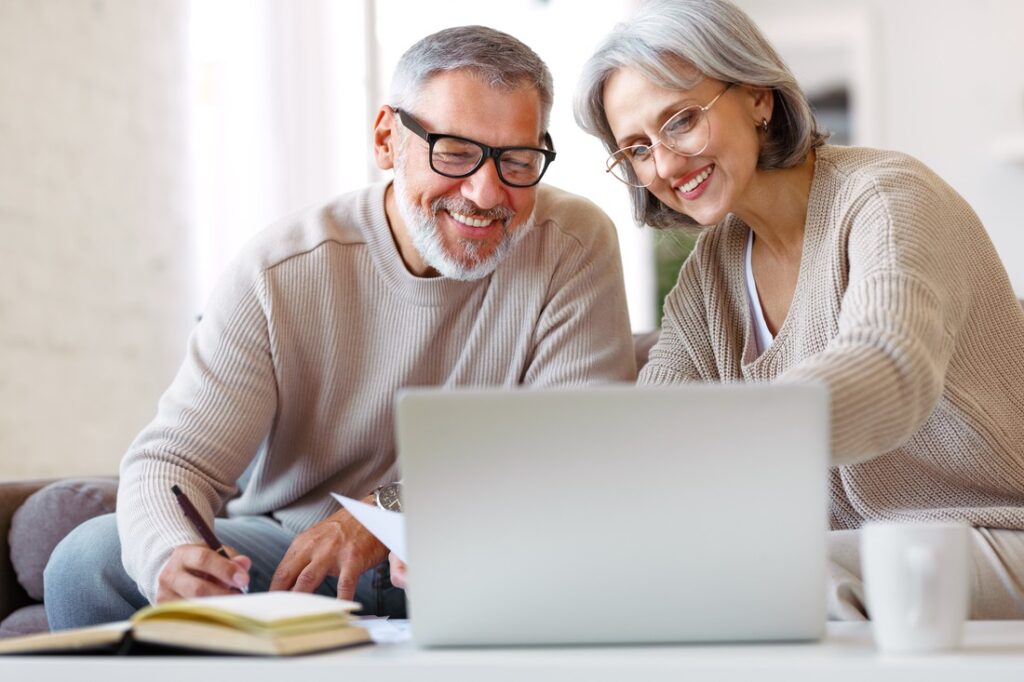 a couple looking at a computer together