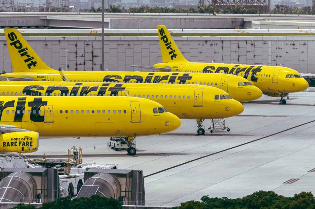 spirit airlines planes at an airport