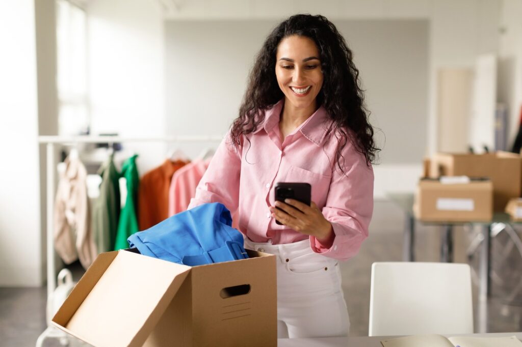 business owner looking at her phone