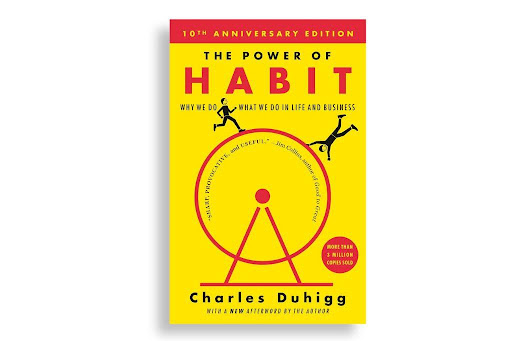 The Power of Habit cover by Charles Duhigg in red and yellow colors.