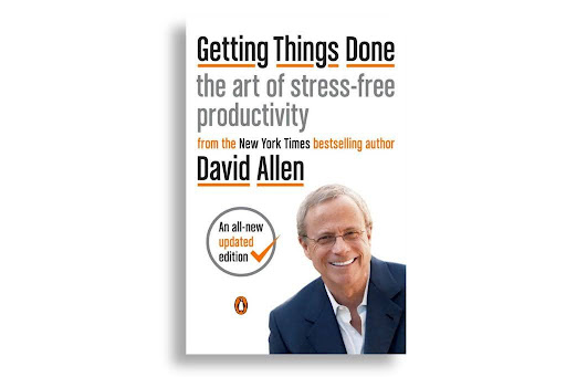 Front cover of David Allen's Getting Things Done bookwith the author portrait on the bottom right.