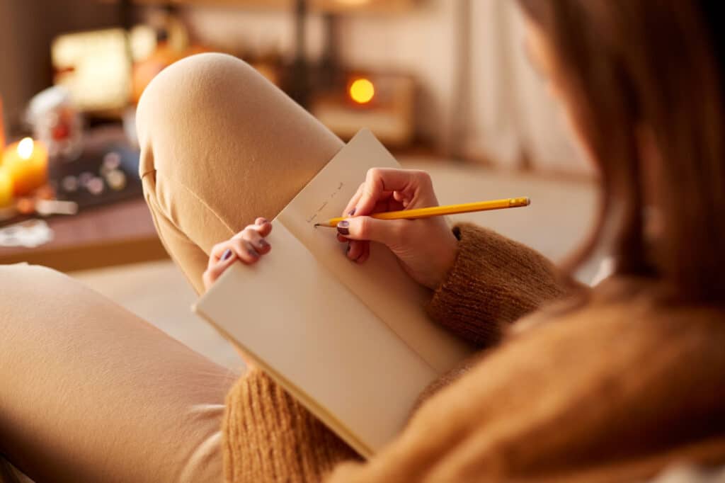 Women writing in a journal