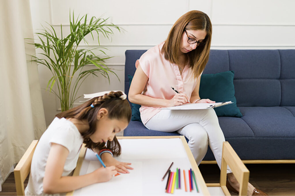 Child and woman engaging in parallel play