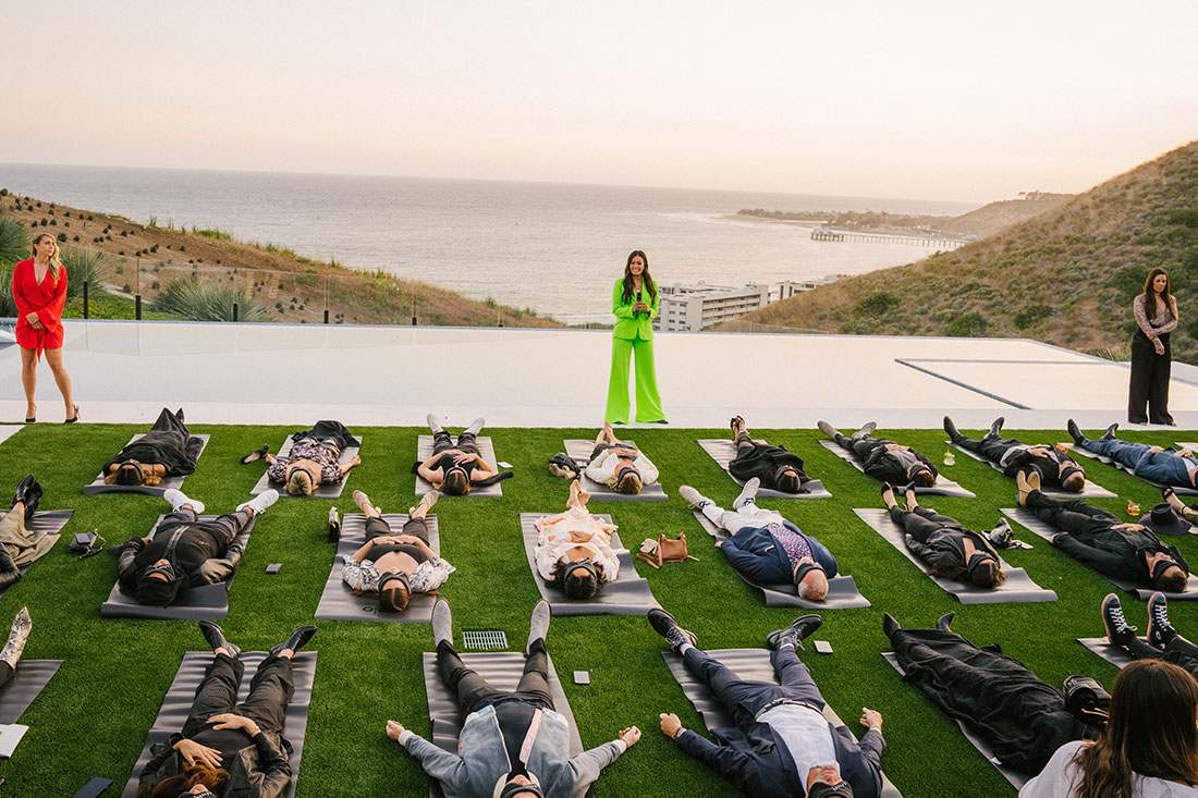 group of people doing guided HypnoBreathwork