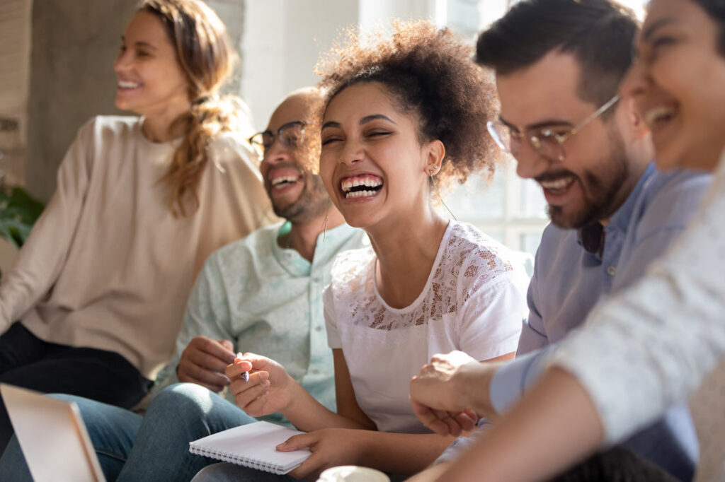 group of young professionals showing emotional intelligence