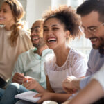 group of young professionals showing emotional intelligence