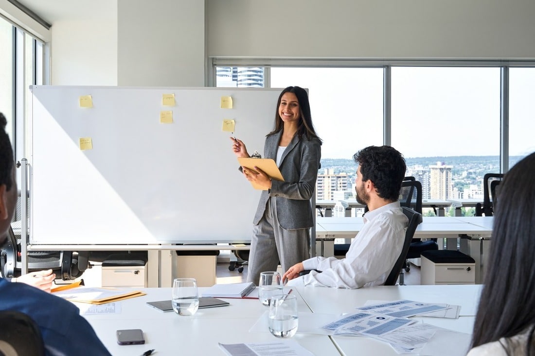 boss giving presentation to employees