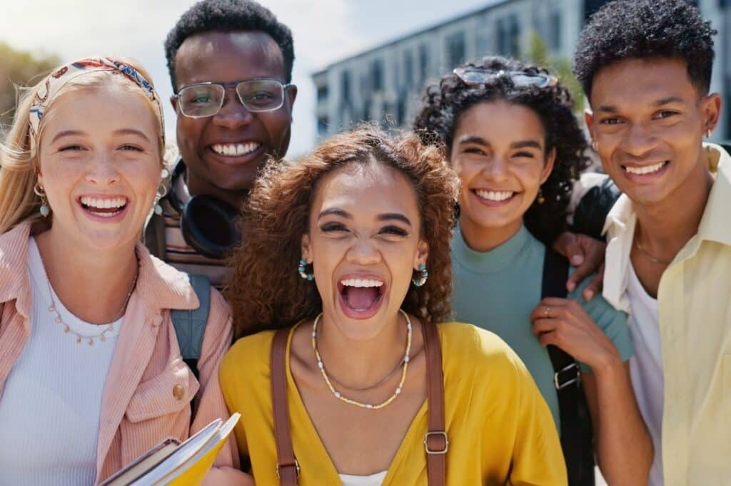 a group of college students smiling