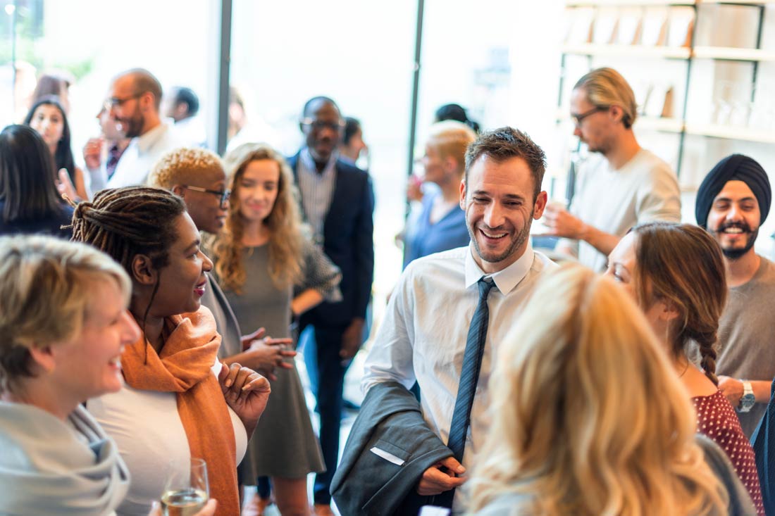 a diverse group of people networking for business