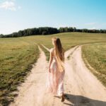 a woman approaches a fork in the road using tips for career change