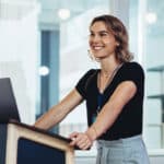 Woman public speaking at a podium